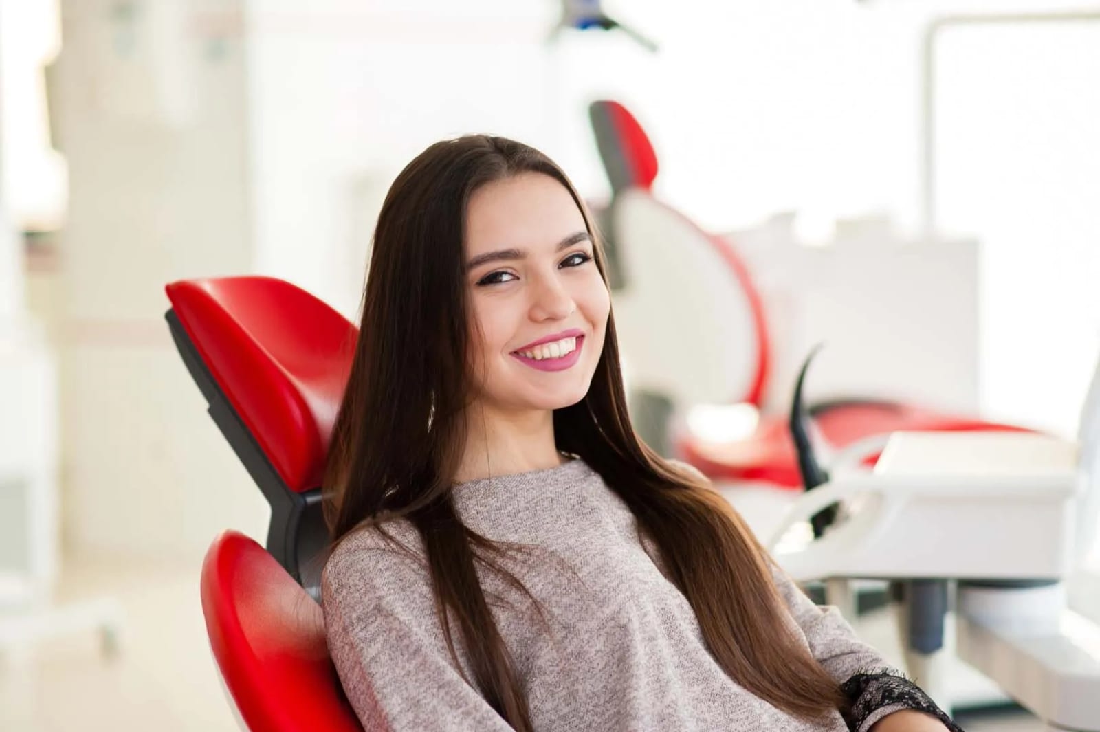 Smiling patient relaxed in the dental chair at Loudoun Valley Oral Surgery